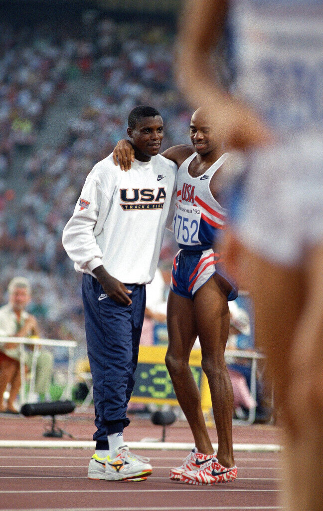 1992: Carl Lewis leads U.S. sweep in long jump in Olympics